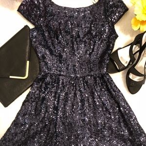 Women’s blue or green sequin mini dress